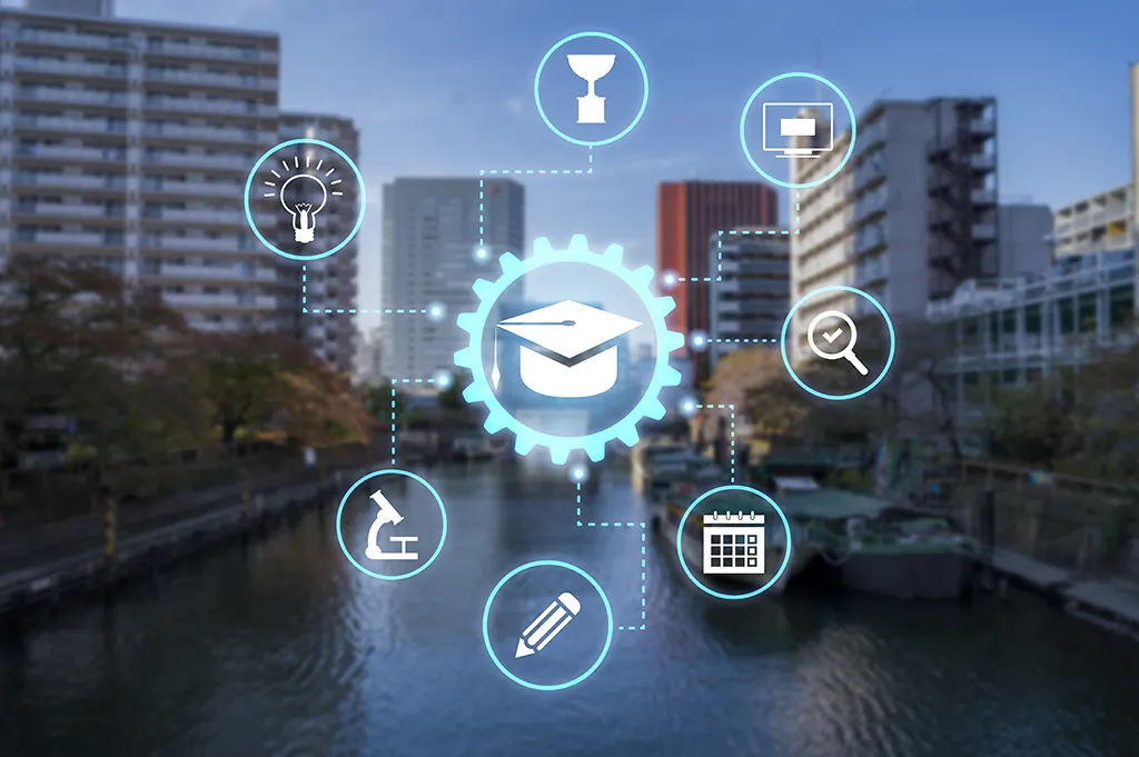 plusieurs icones de logiciels reliés àun chapeau de diplomé et en fond d'écran une ville